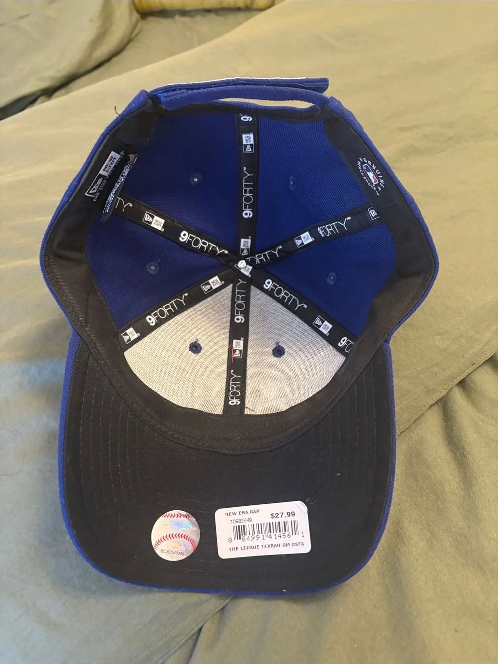 New Era Blue Baseball Cap with White and Red T Logo
